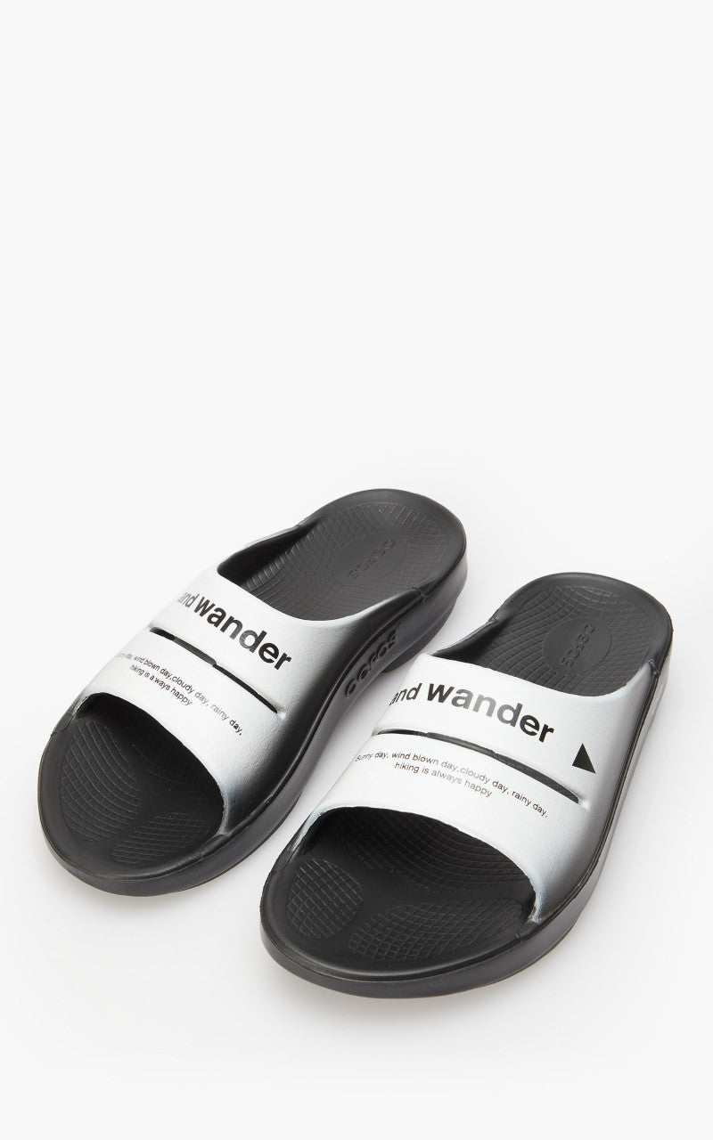 and wander x OOFOS Ooah Slide Black/White
