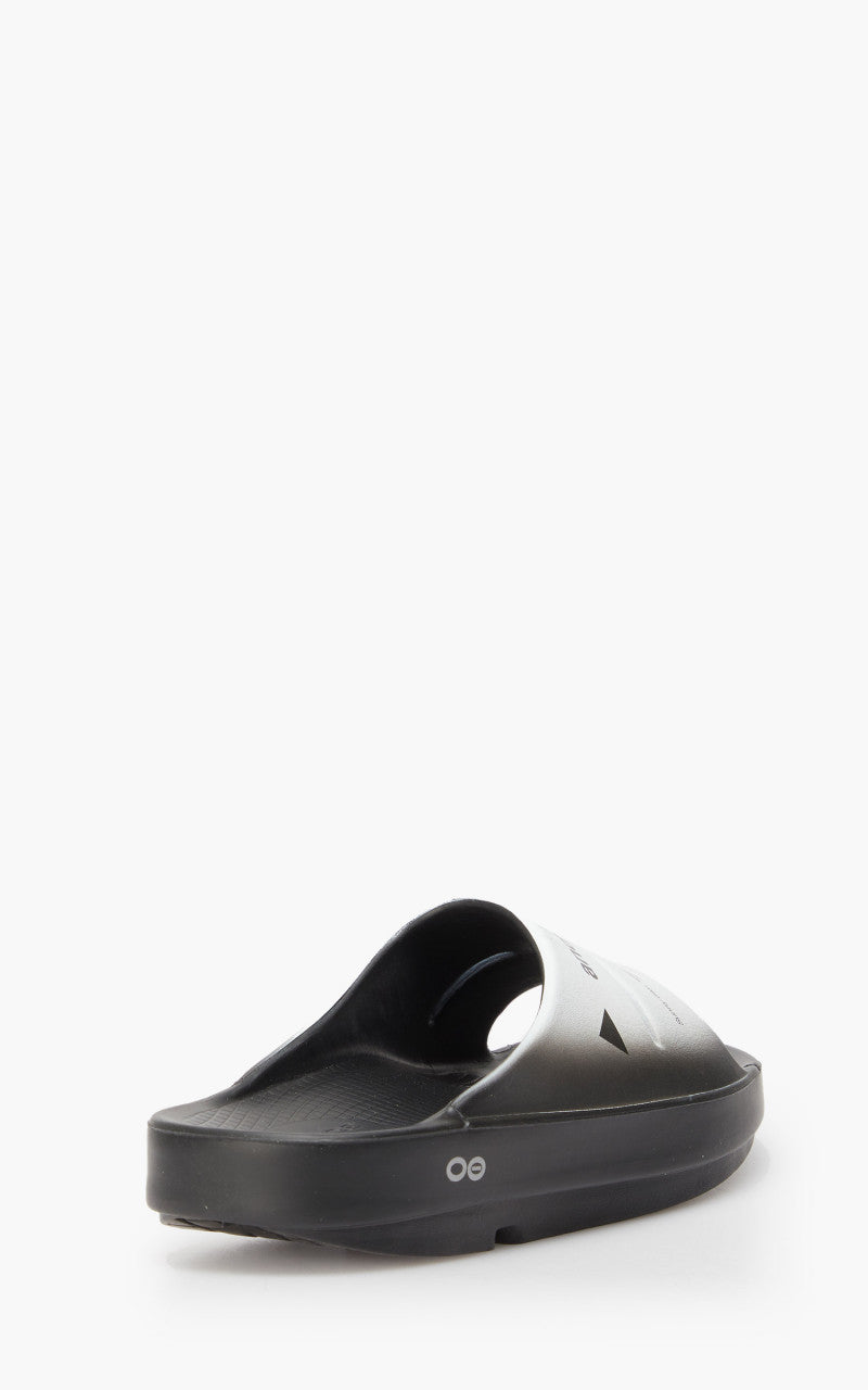 and wander x OOFOS Ooah Slide Black/White