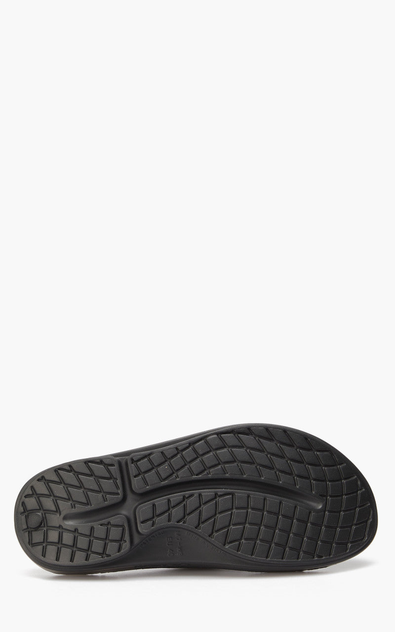and wander x OOFOS Ooah Slide Black/White