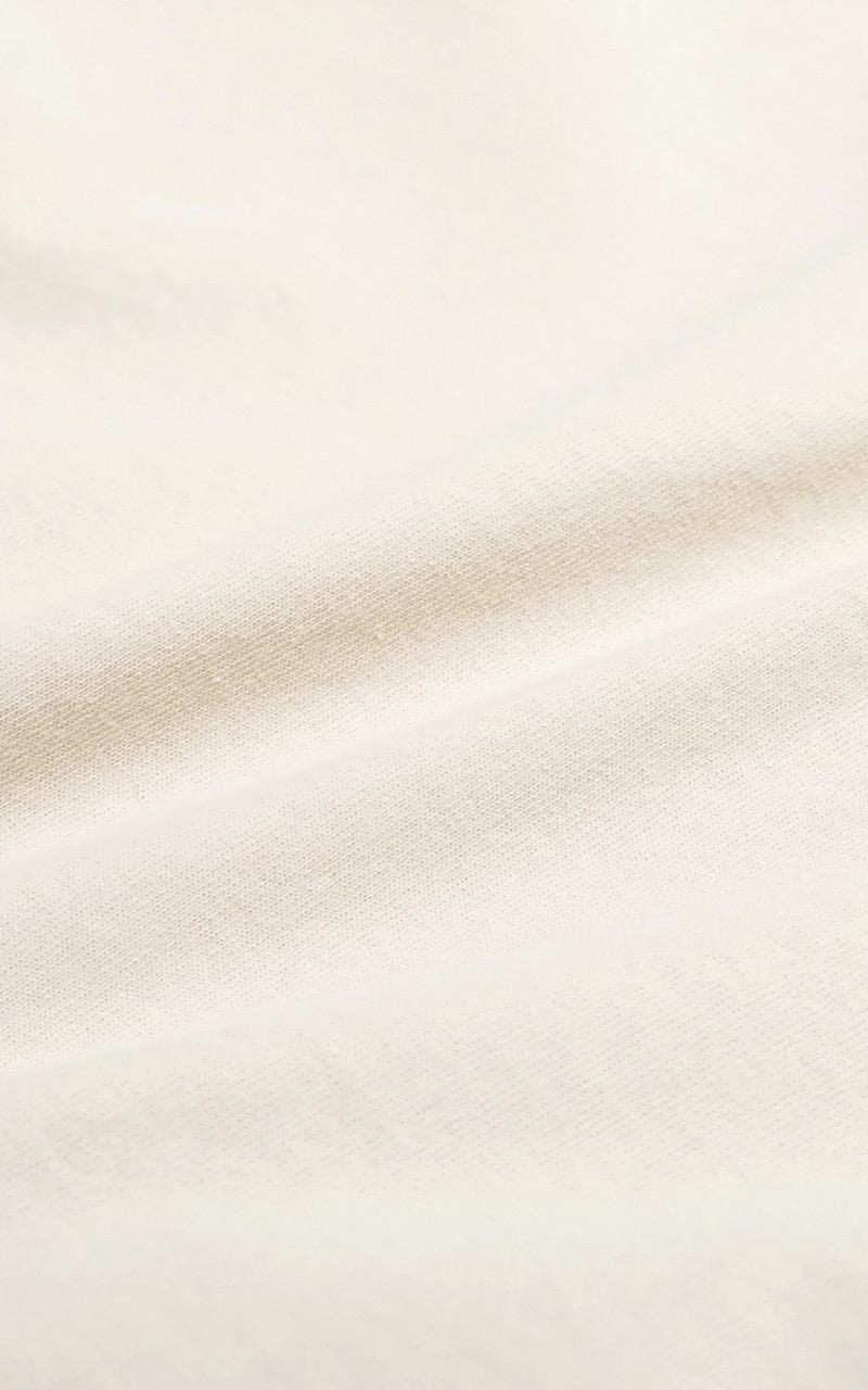 Sporty & Rich Health Is Wealth T-Shirt Cream