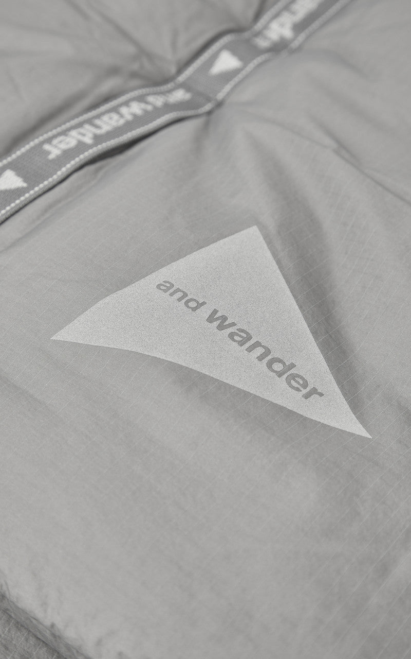 and wander Primaloft Rip Muffler Grey